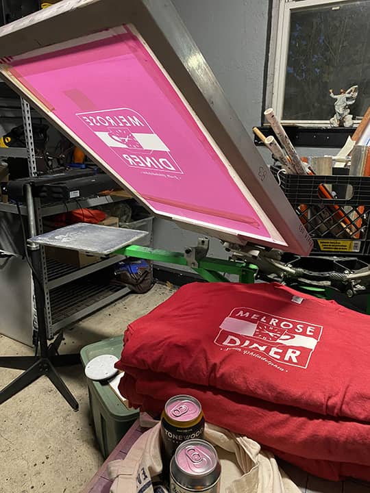 Screen printing the Melrose Diner t-shirts.